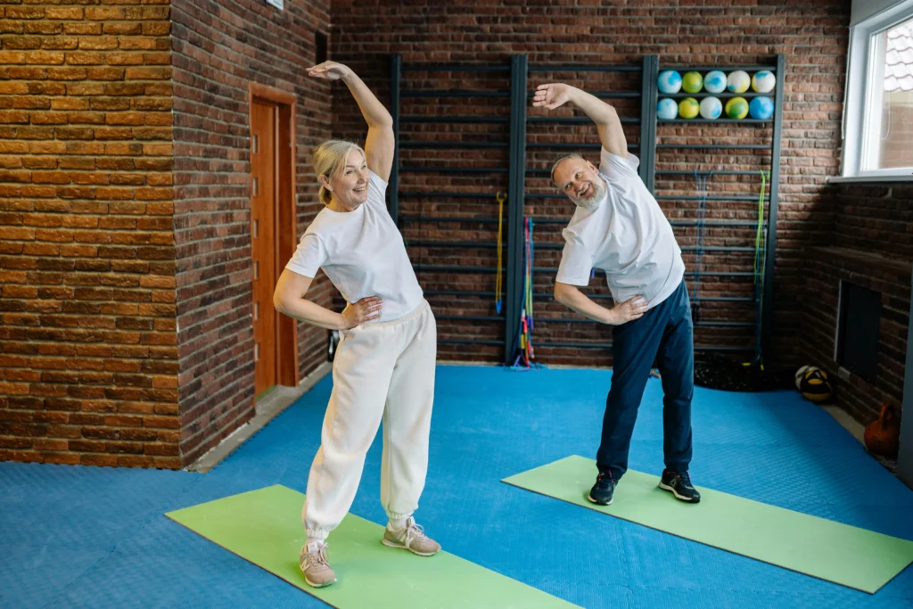People doing exercise and stretching for better heart health while using Atorvastatin 40mg for cholesterol management