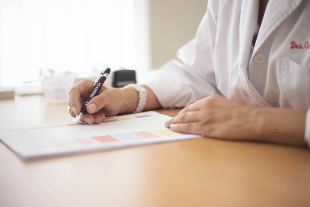 Does amoxicillin treat UTI - doctor writing prescription for urinary tract infection treatment