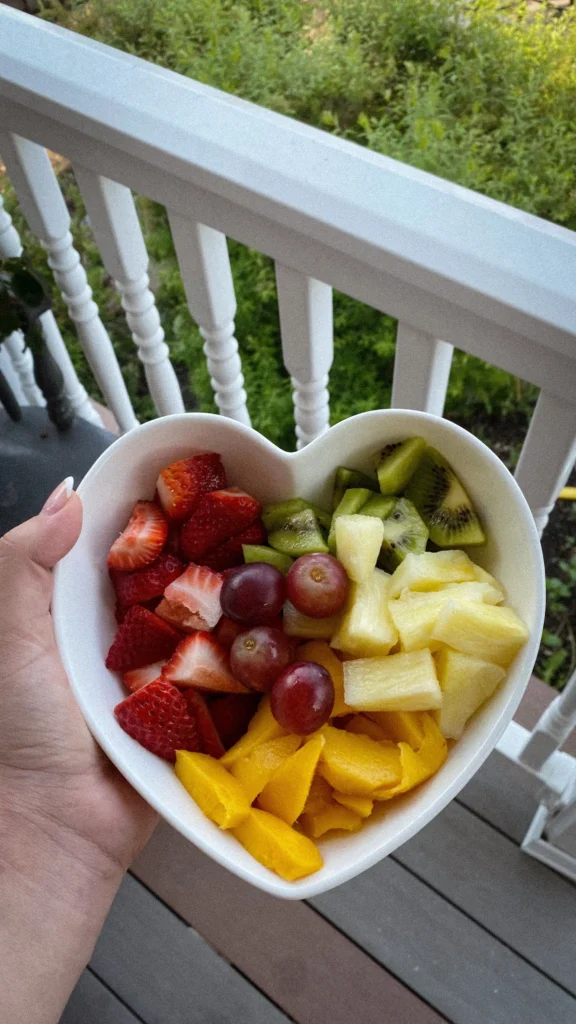 High blood pressure exercise with a bowl of fresh fruits to support heart health and healthy blood pressure
