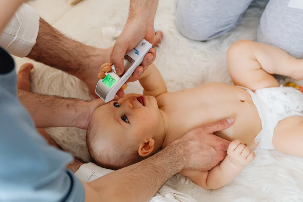 Infant fever temperature check using a non-contact infrared thermometer at home
