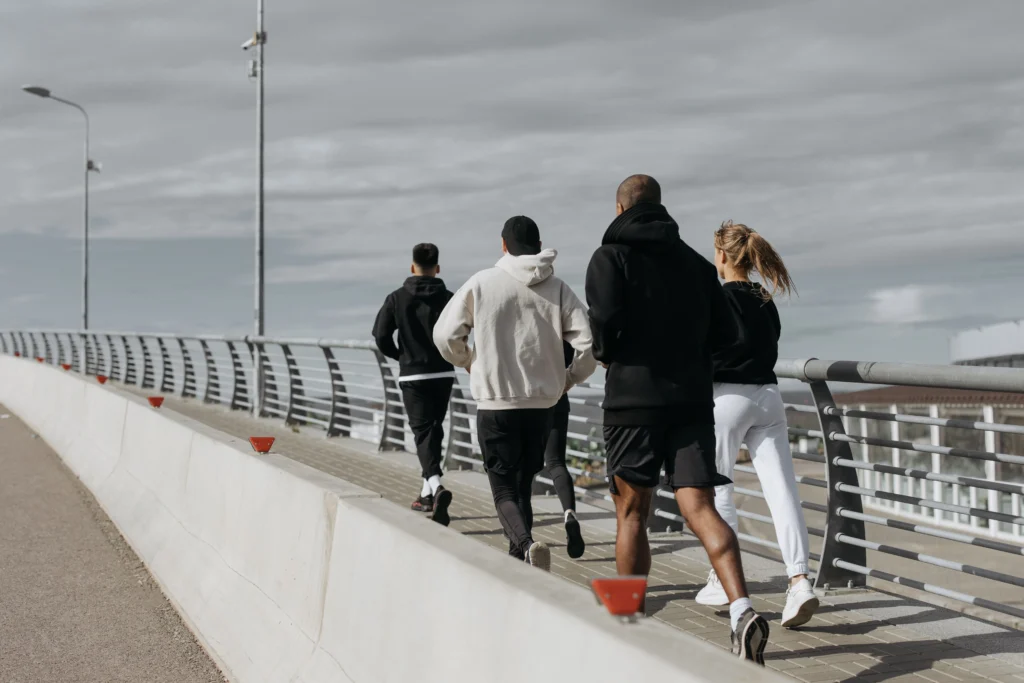 People staying active outdoors after receiving a Yellow Fever Jab vaccine for travel health protection